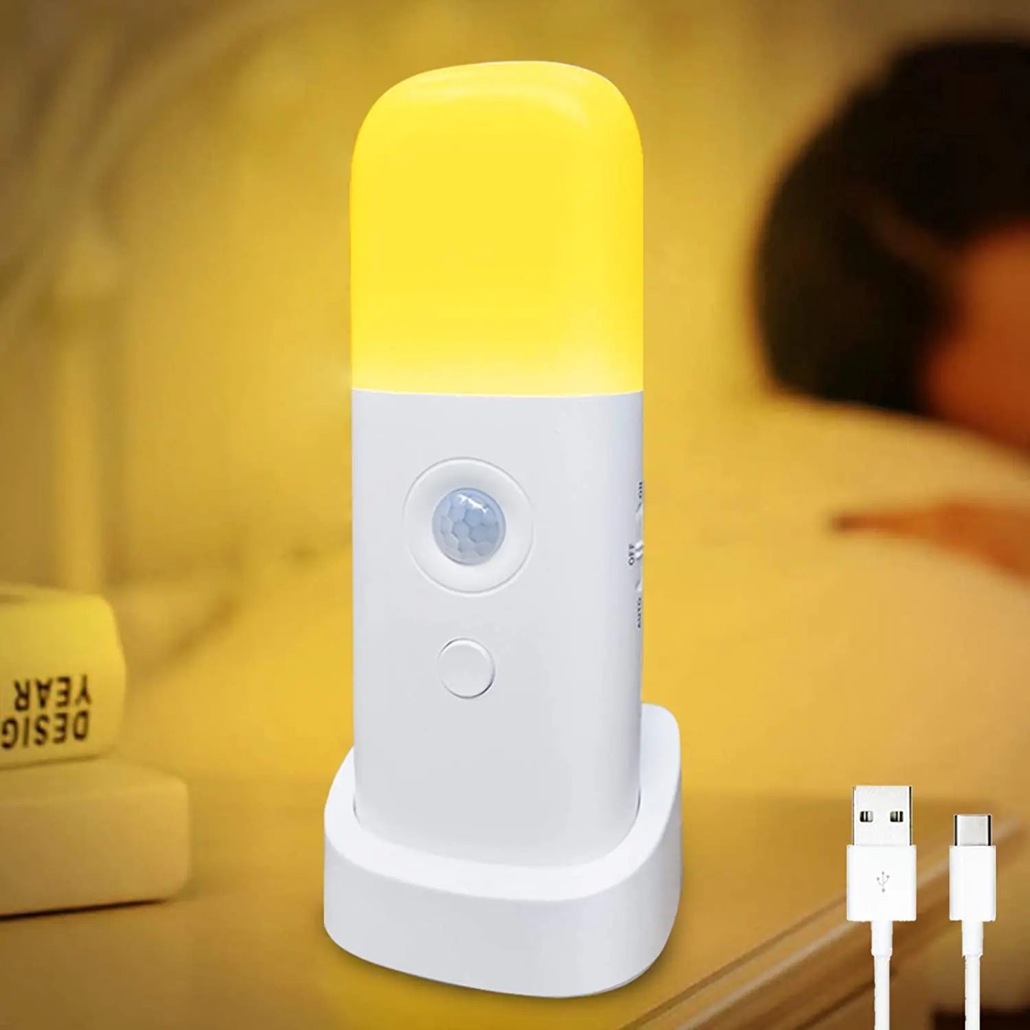 Yellow and white motion sensor light on a blurred background